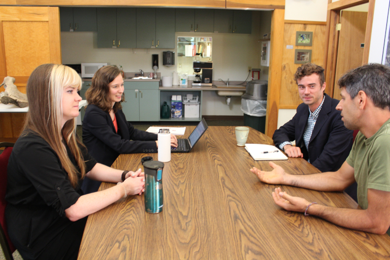 From left: ISDP Program Manager Danni Schaust, ERI Implementation Manager Andrea Webster, Resilience Cohort Extern Bronson Bast, City Forester Aaron Sawatsky-Kingsley, as they discuss progress on Goshen's greenhouse gas inventories