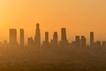 skyline of a city covered by smog