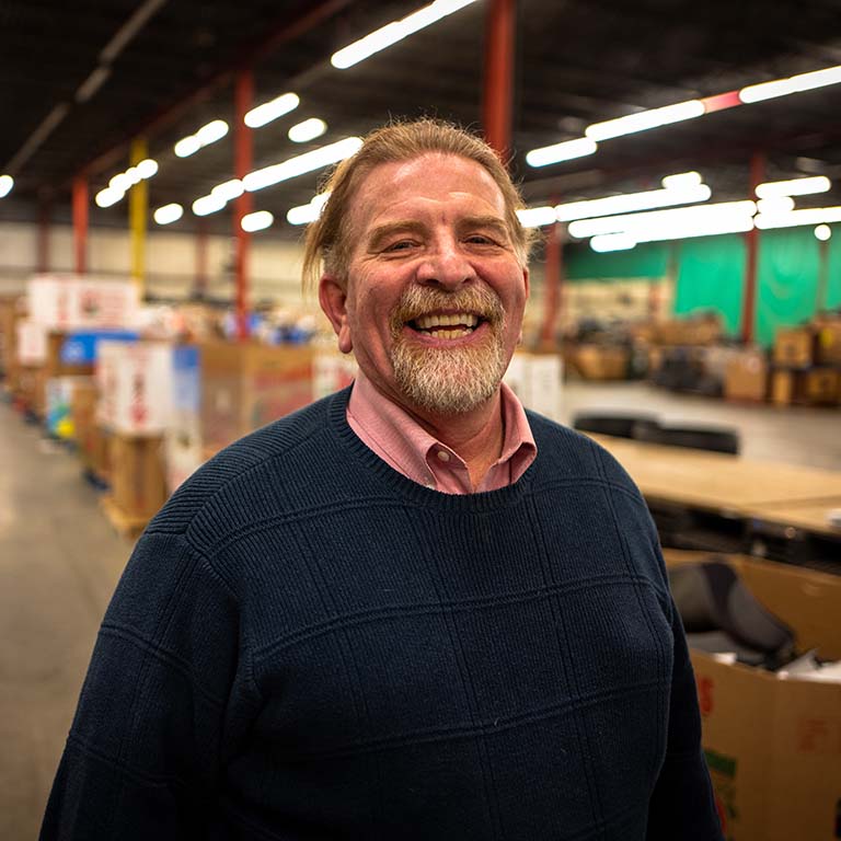 Gregg Keesling standing in a warehouse facility