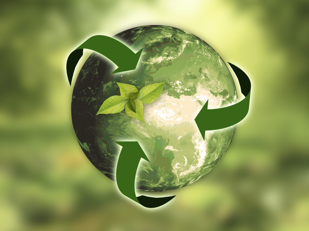 Decorative: graphic of the earth with a recycling symbol