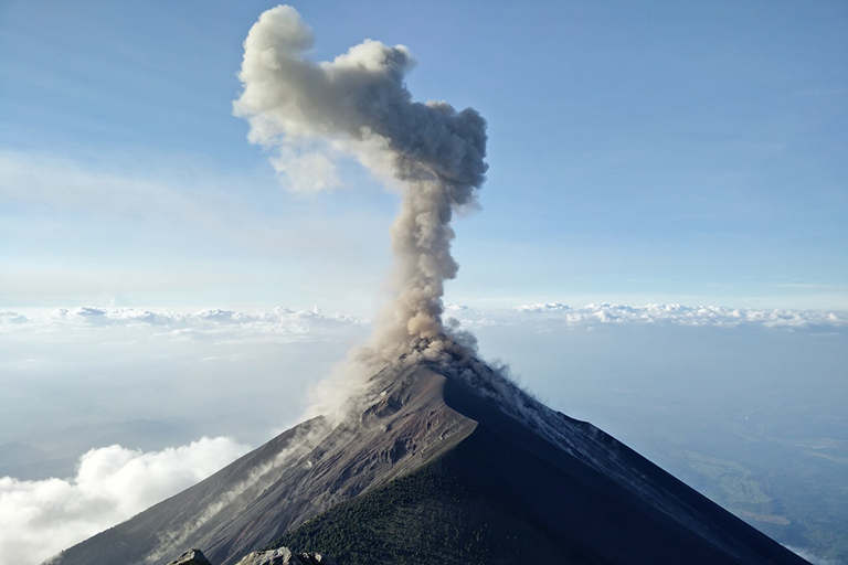 A volcano with smoke coming out